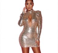 attacked woman in gold sequins sleeves with no back celebrity cocktail dress