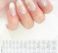 26pcs Graphic Fake Nail & 1pc Nail File