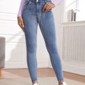 Cut Out Waist Skinny Jeans