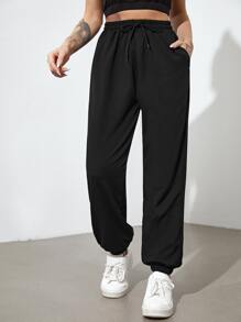 Solid Slant Pocket Drawstring Sports Pants